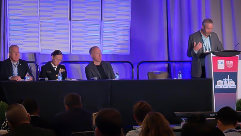 PDA/FDA 2026 panel: Bob Buhlmann of Gilead, Liatte Closs of FDA, and Jack Prior, with moderator Christopher Downey of FDA at the podium